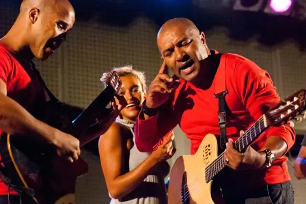Guitarists and singers performing together